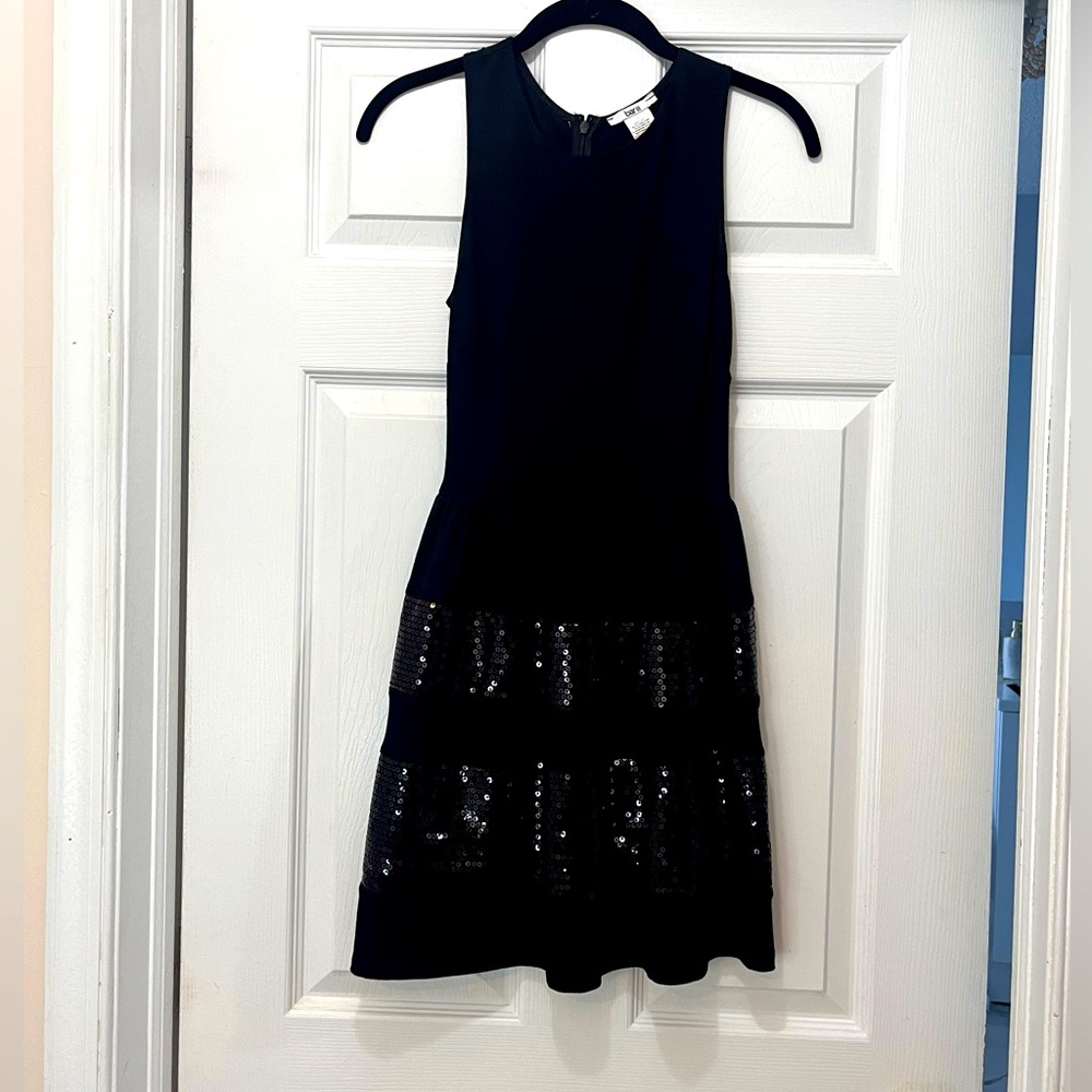 Little black dress with sequins skirt